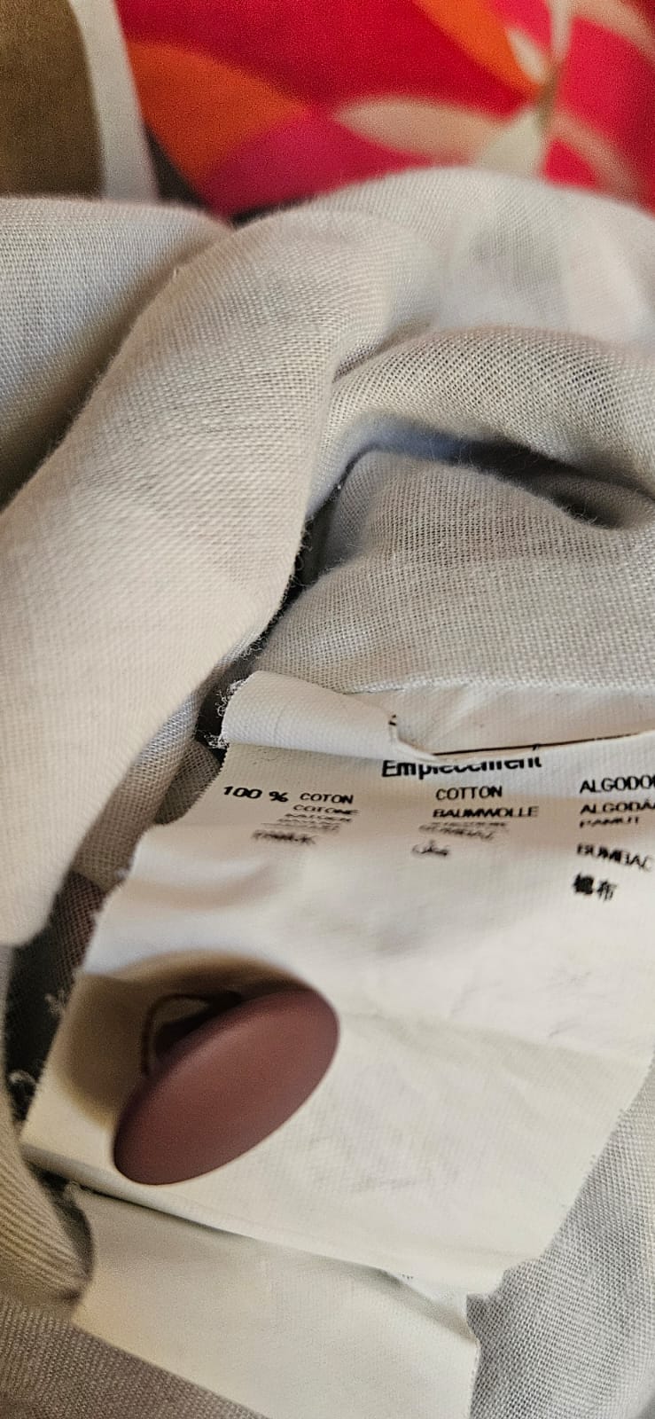 Close-up of a label on a piece of fabric with a blurred background