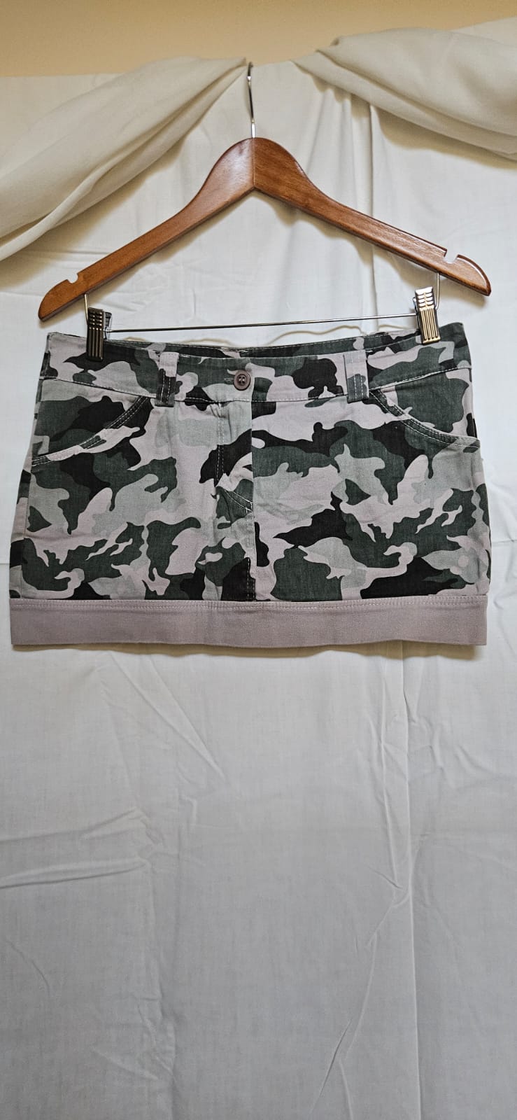 Styled in Italy camo print denim mini skirt on hanger