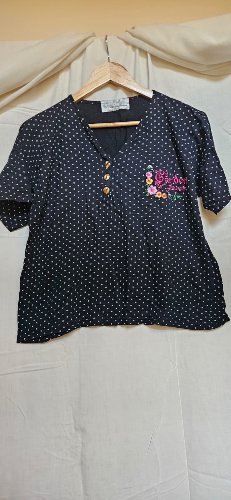 Styled Garden vintage polka dot blouse on hanger - full view