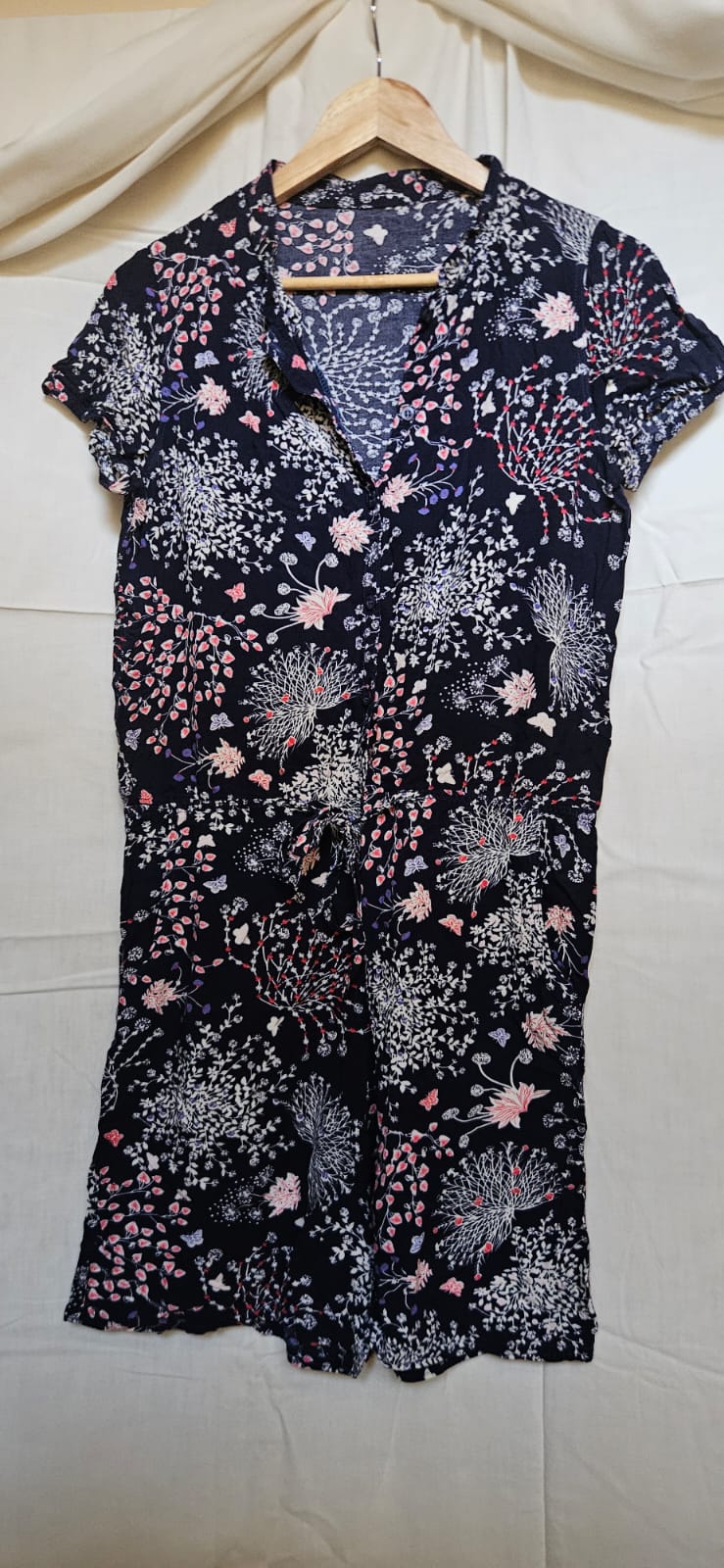 Navy botanical floral button-through midi dress on hanger