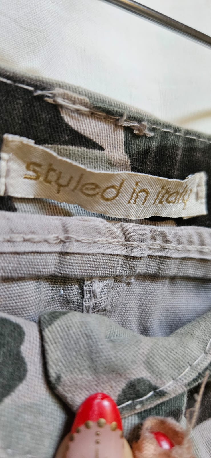 Styled in Italy brand label inside waistband