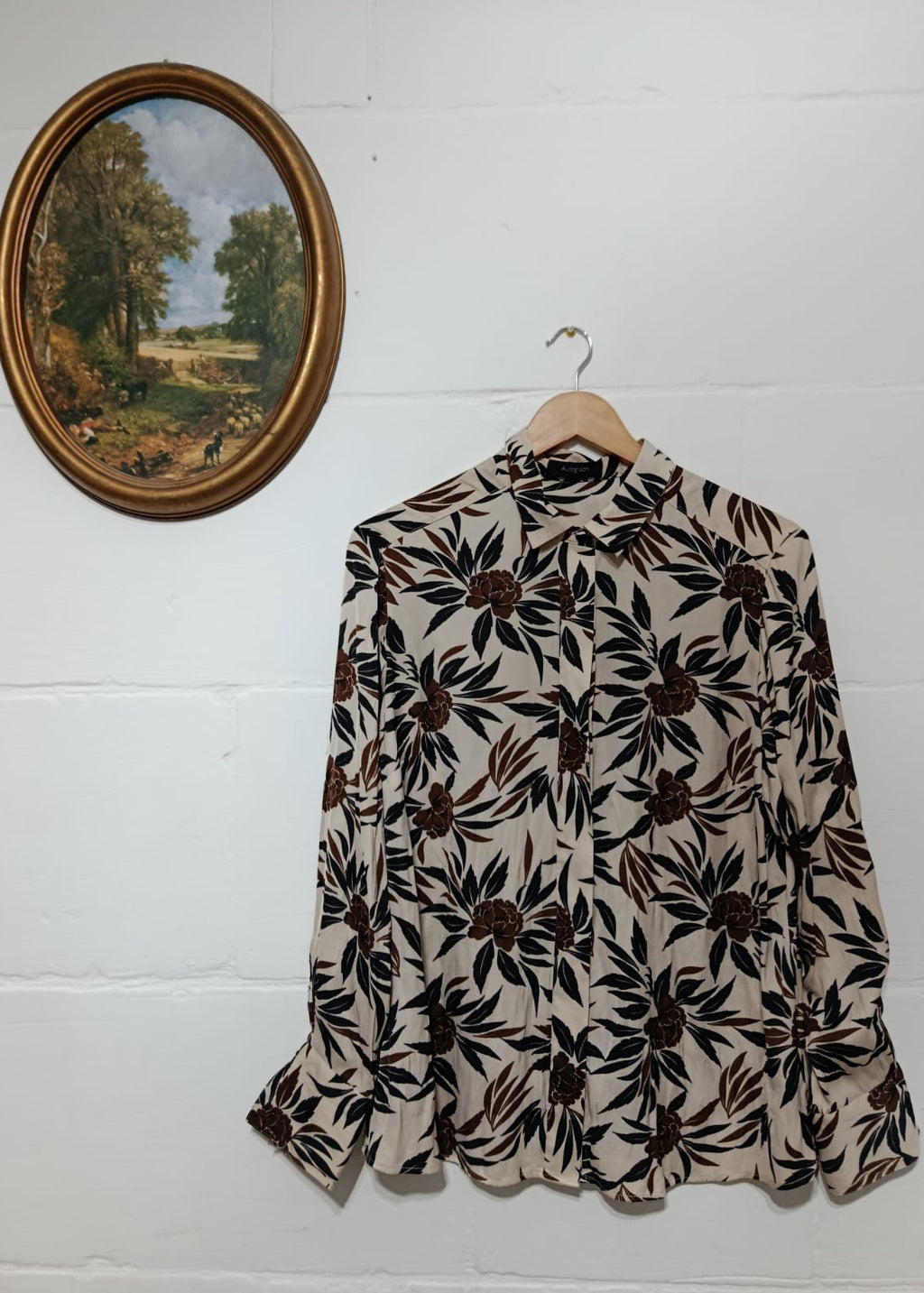 Full view of an Autograph cream floral button-down blouse in size M-L