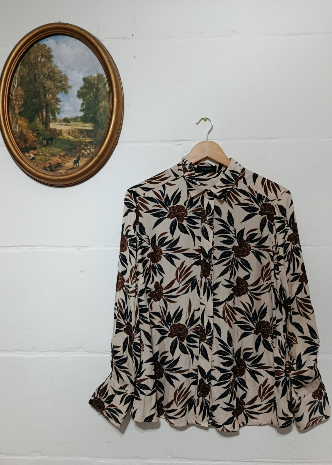 Full view of an Autograph cream floral button-down blouse in size M-L