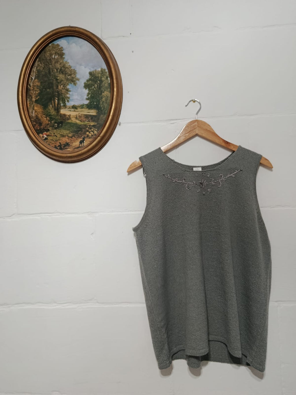 Grey embroidered knit two-piece set with a sleeveless top and matching cardigan