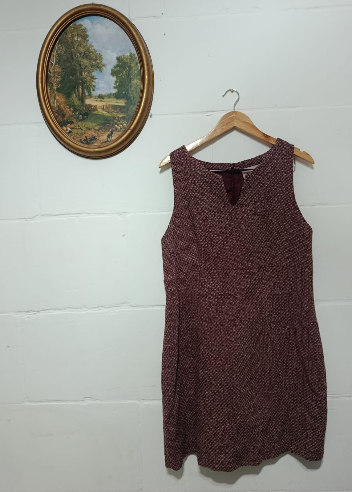 Full view of an Axiome Women deep burgundy sleeveless dress, size 44