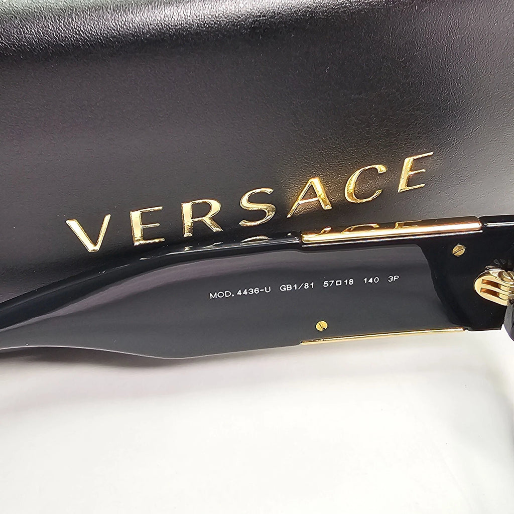 Versace sunglasses temple showing model number MOD 4436-U with Versace case